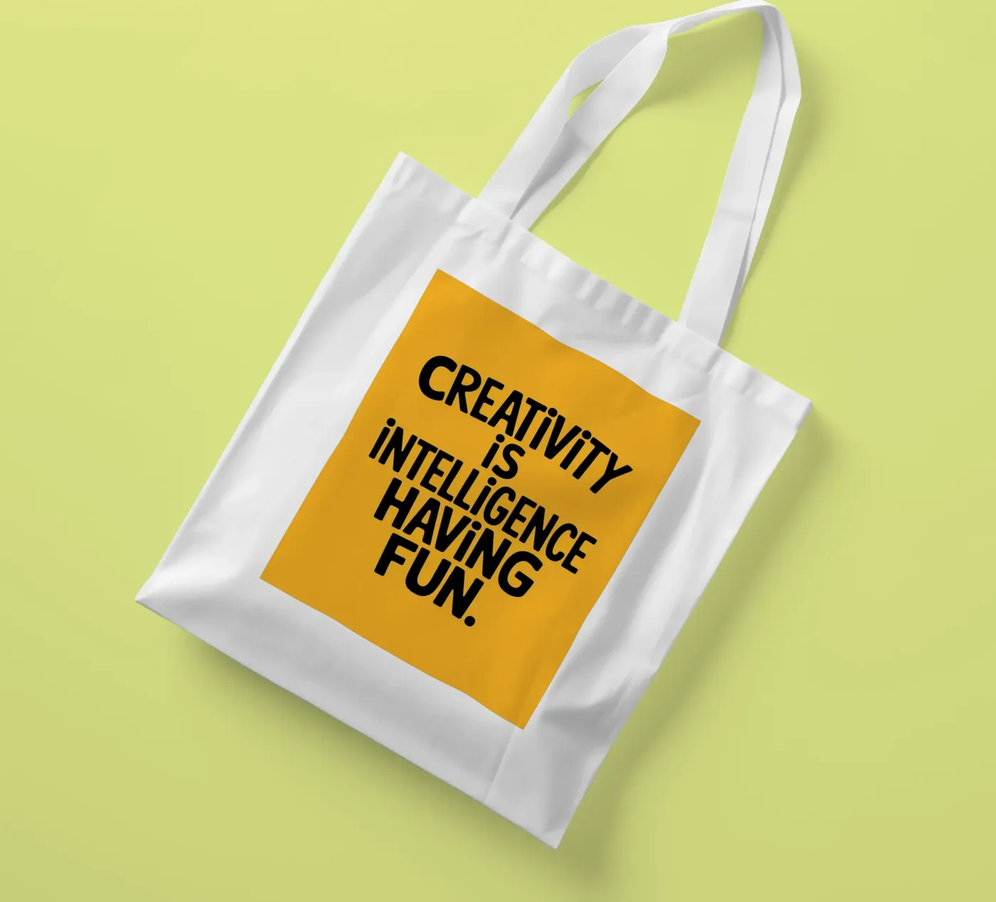 Creativity is intelligence having fun. tote bag by logic