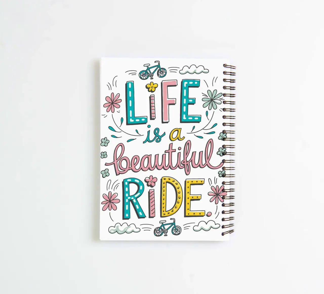 LIFE is a beautiful RIDE. spiral notebook by logic