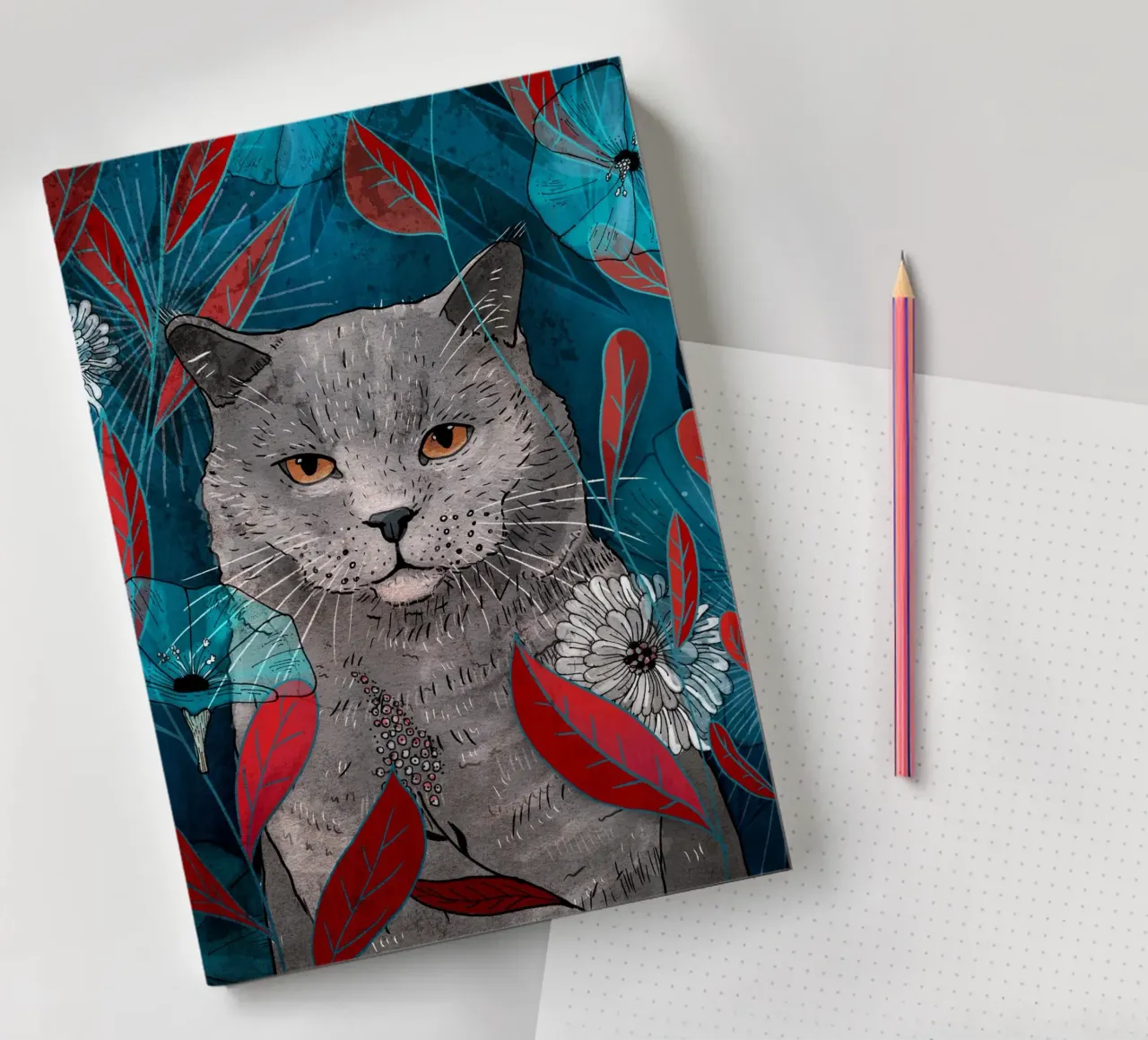Cat with blue flowers and red leaves notebook by AnimalArt