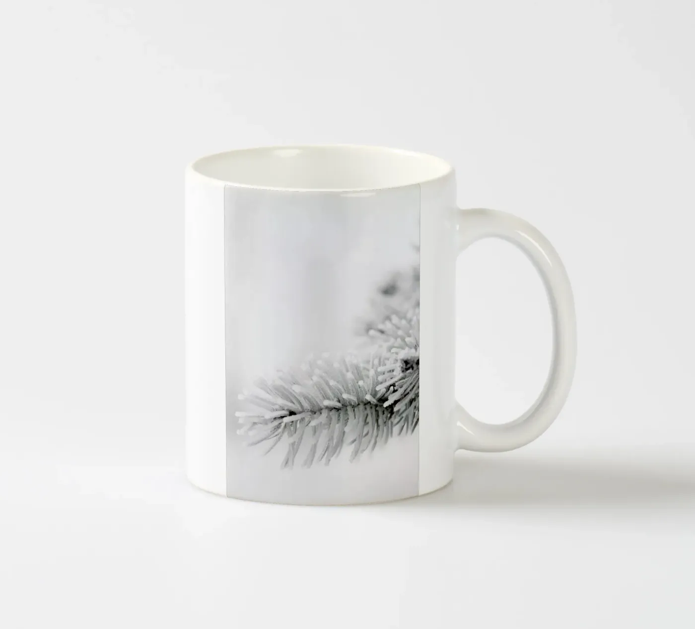 White ceramic mug by Studio Nahili