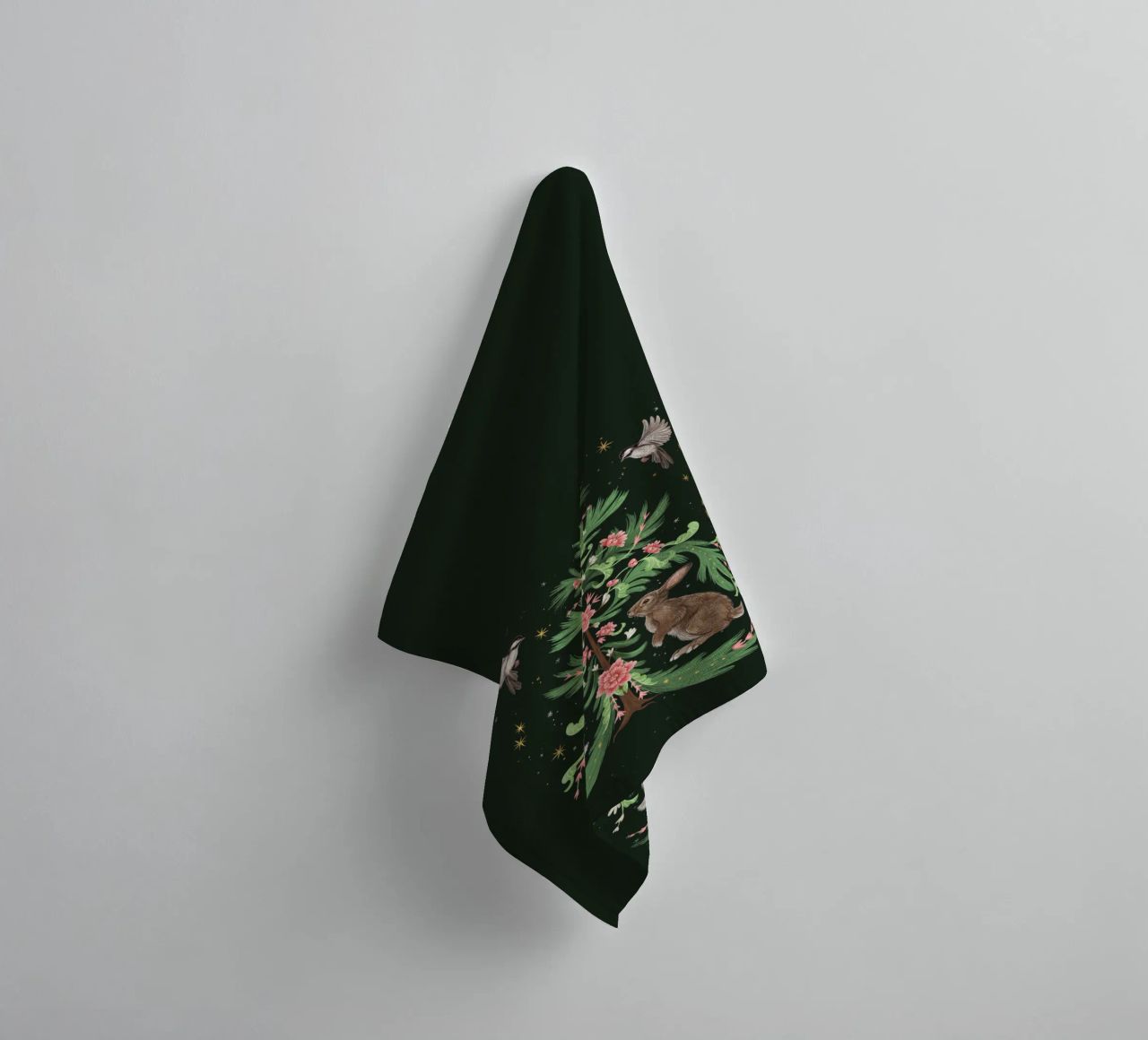 Yule Tree Rabbits towel by Laura Graves