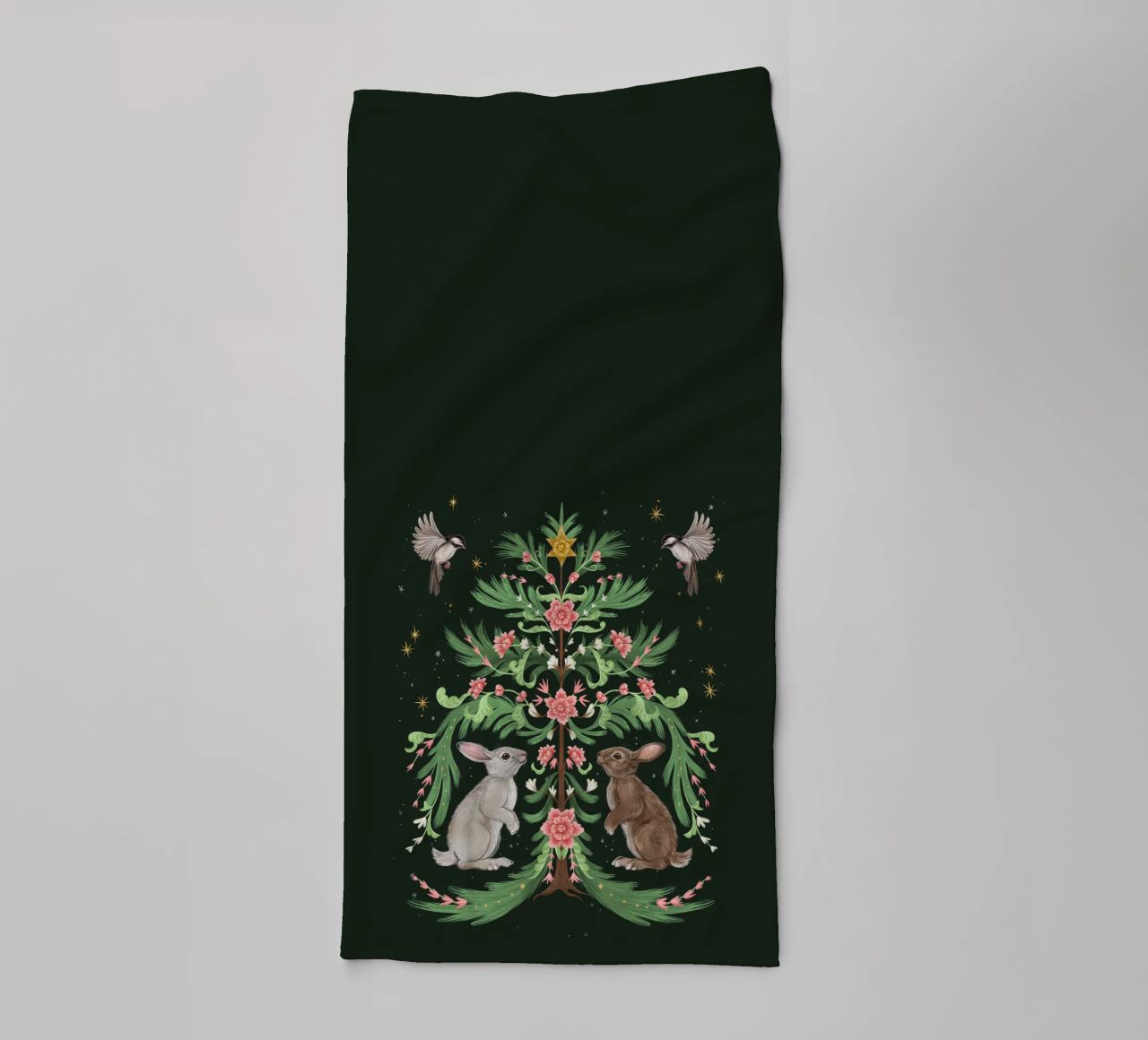 Yule Tree Rabbits towel by Laura Graves