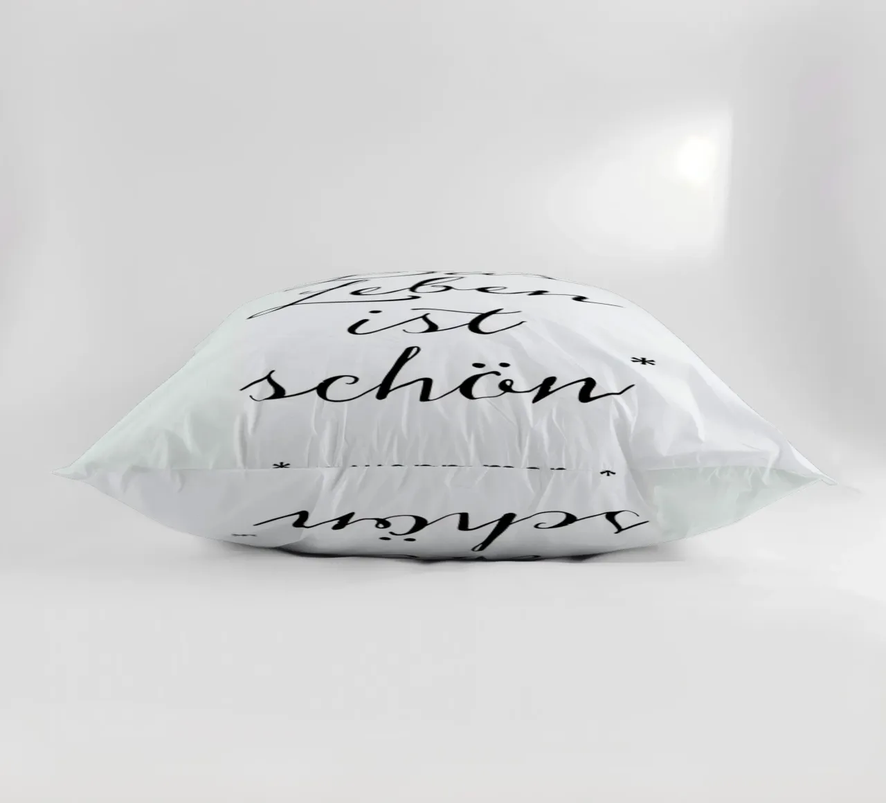 Das Leben ist schön decorative cushion by Amy & Kurt