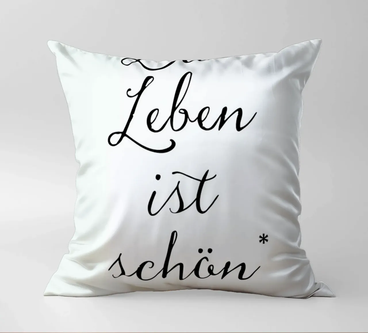 Das Leben ist schön decorative cushion by Amy & Kurt