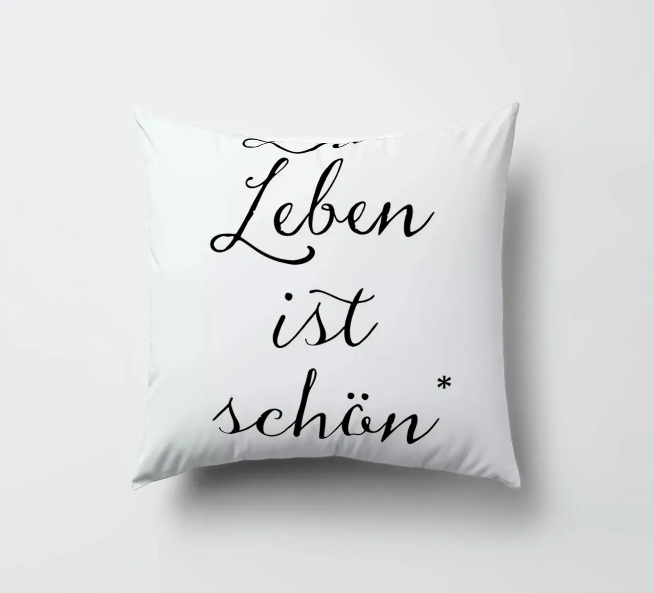Das Leben ist schön decorative cushion by Amy & Kurt
