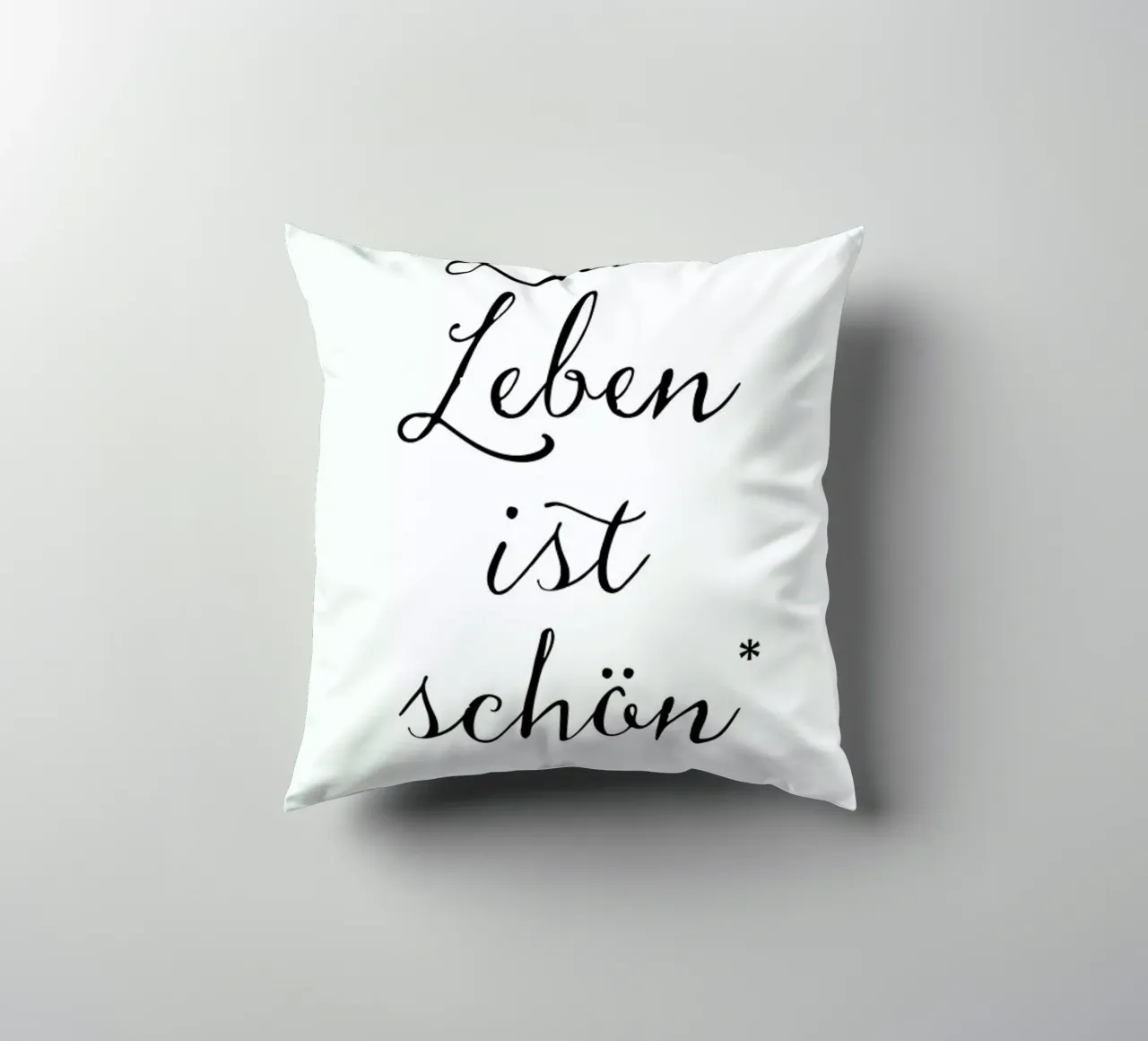 Das Leben ist schön decorative cushion by Amy & Kurt