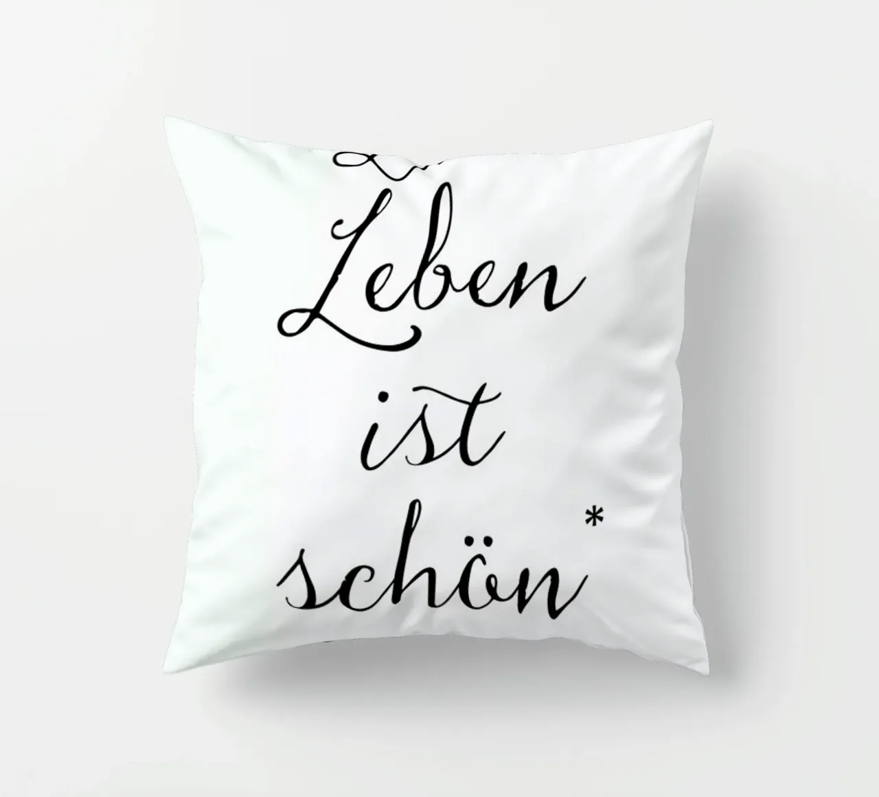 Das Leben ist schön decorative cushion by Amy & Kurt