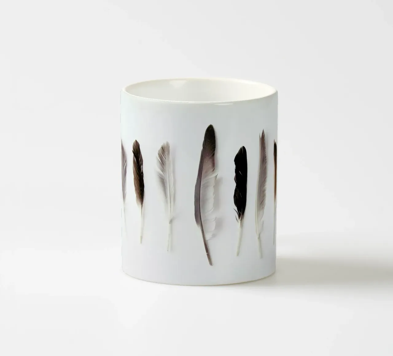Autumn Feathers ceramic mug by Miles of Light