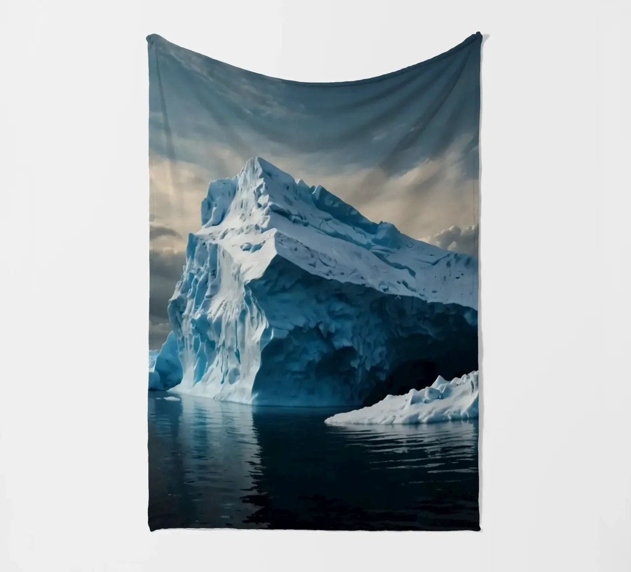 Impressive icebergs reflecting in tranquil waters fleece blanket by DesignDoodle