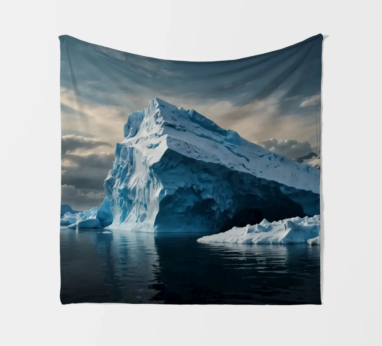 Impressive icebergs reflecting in tranquil waters fleece blanket by DesignDoodle