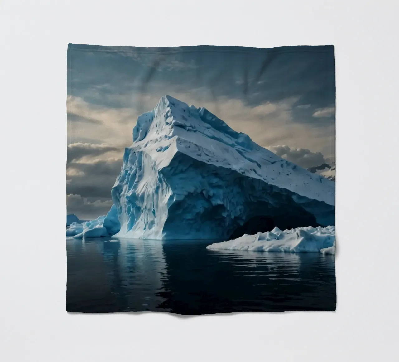 Impressive icebergs reflecting in tranquil waters fleece blanket by DesignDoodle