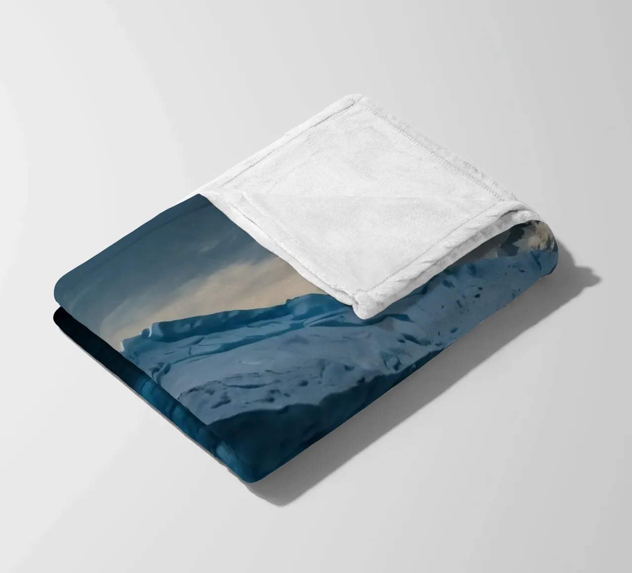Impressive icebergs reflecting in tranquil waters fleece blanket by DesignDoodle