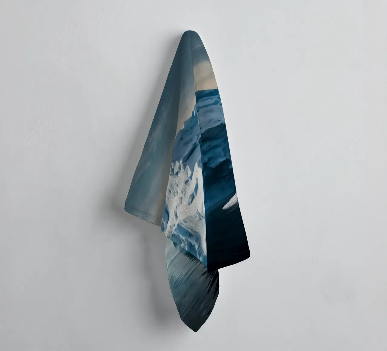 Impressive icebergs reflecting in tranquil waters towel by DesignDoodle