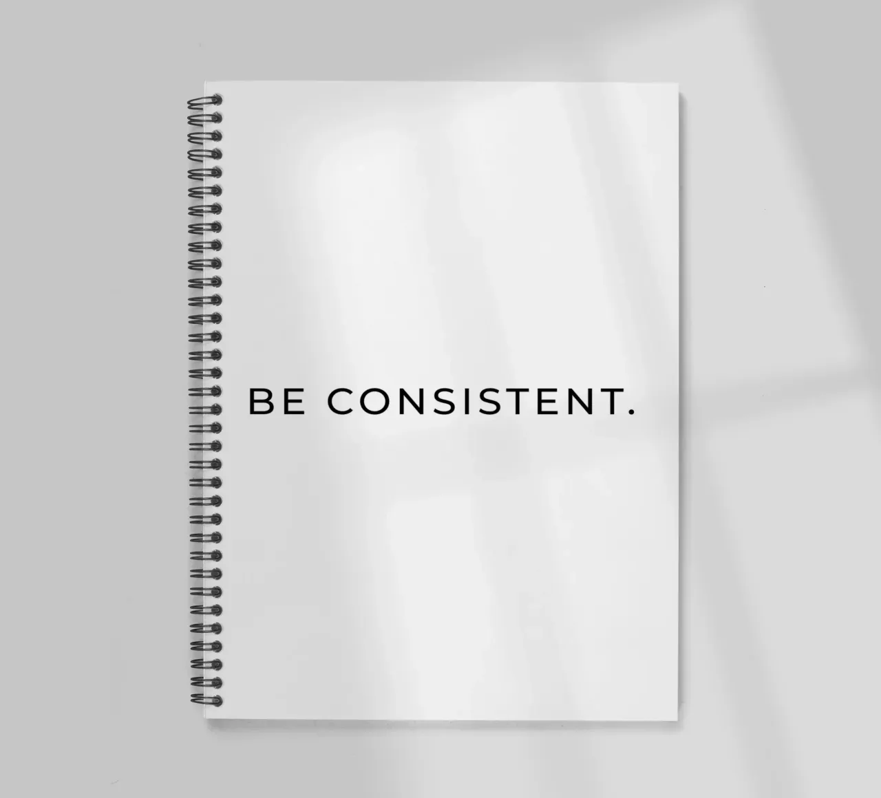 Be consistent quote spiral notebook by Paigaam Studio