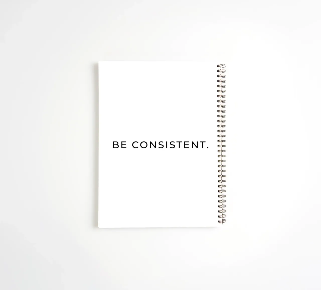 Be consistent quote spiral notebook by Paigaam Studio