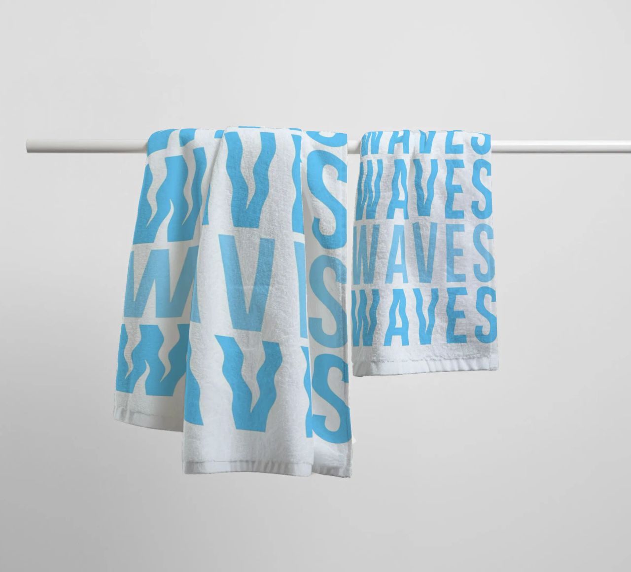 Waves Typography towel by Attaboy Dsgn