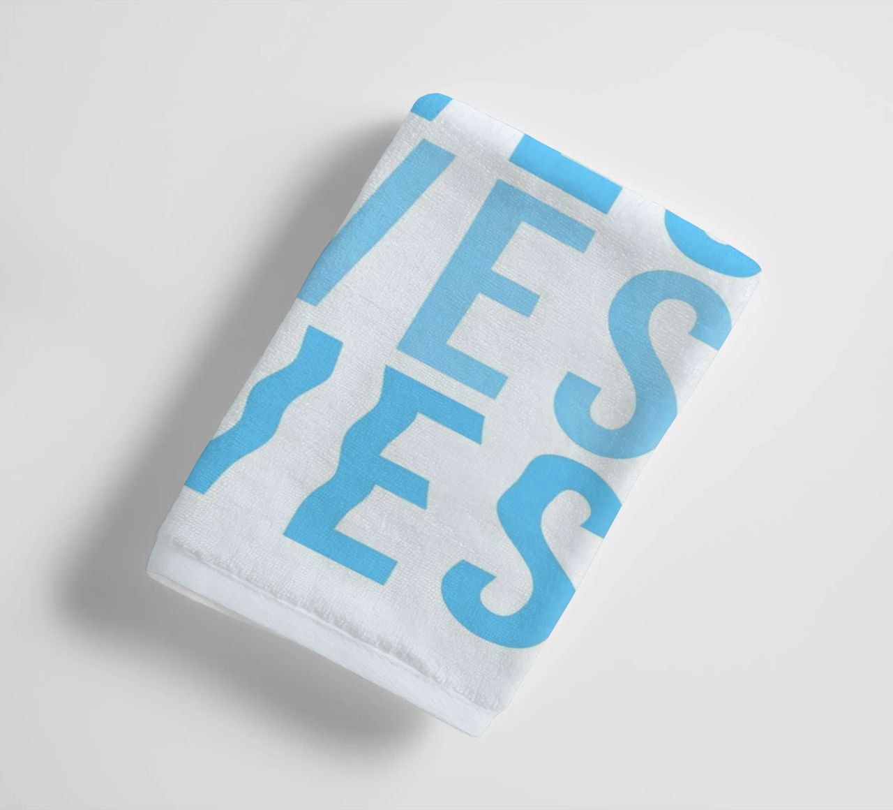 Waves Typography towel by Attaboy Dsgn