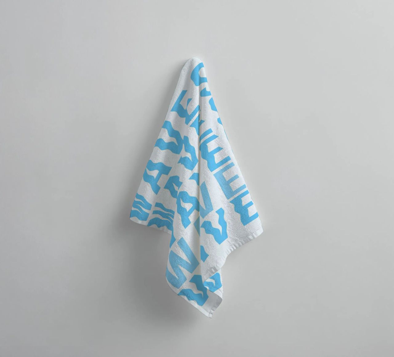 Waves Typography towel by Attaboy Dsgn