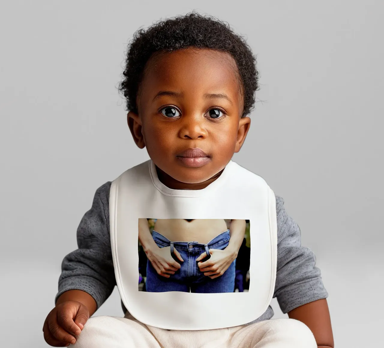 Denim baby bib by Aysha Banos