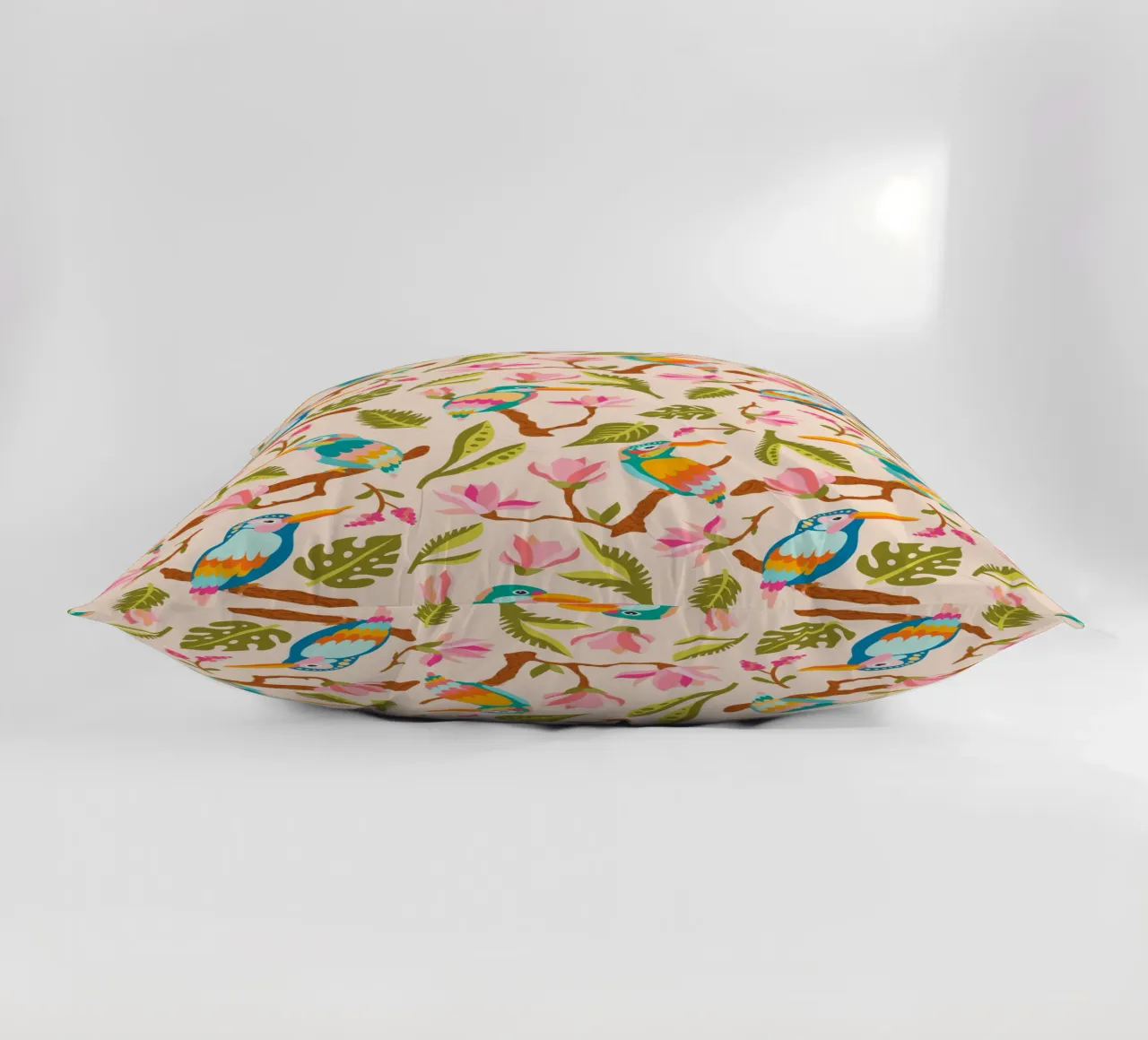 Kingfishers and magnolia patterns in pastel colours decorative cushion by CoelfenArt