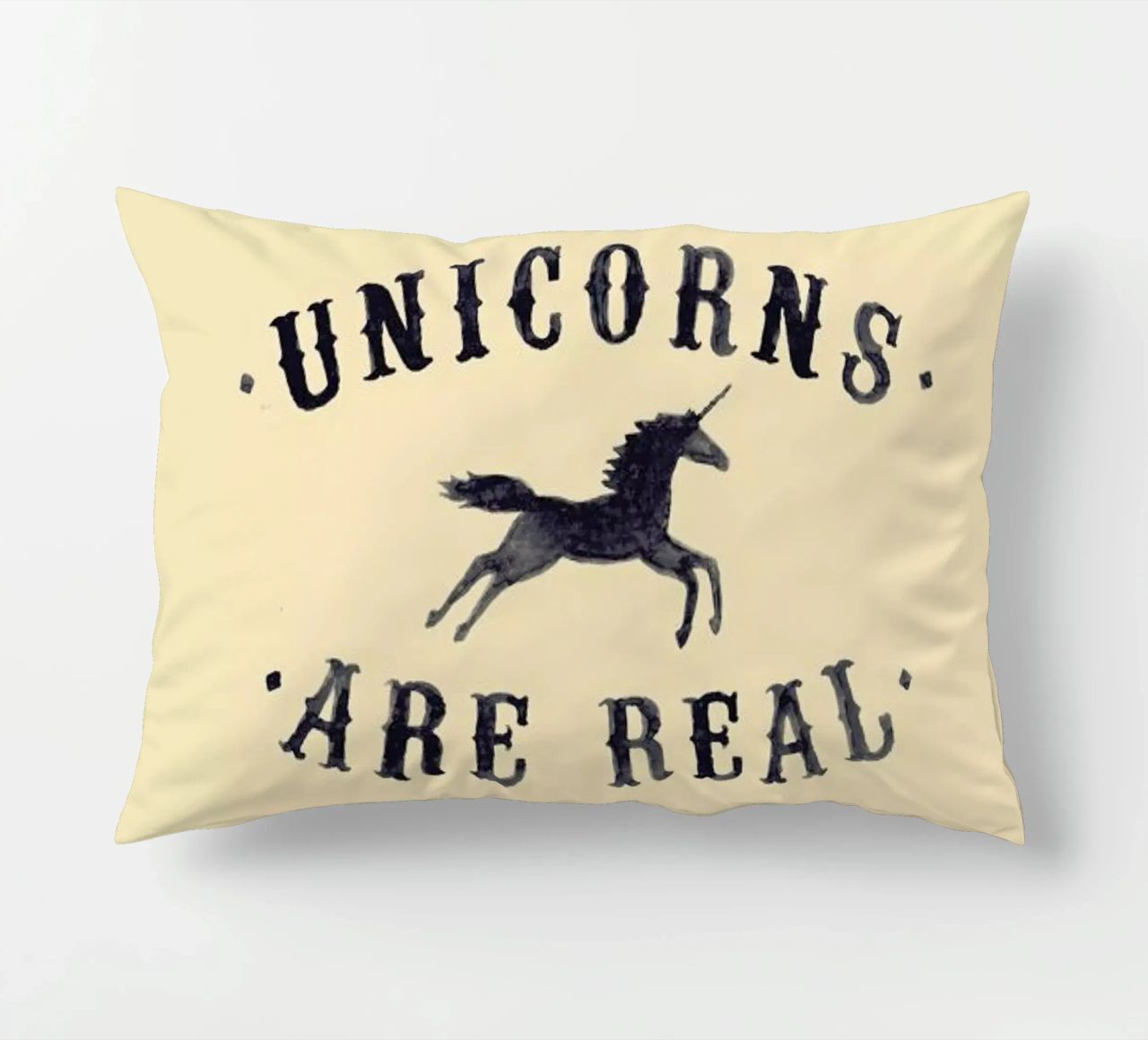 Unicorns Are Real I decorative cushion by Florent Bodart
