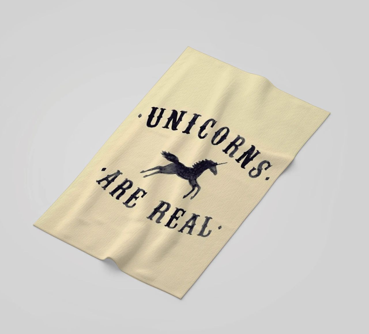 Unicorns Are Real I beach towel by Florent Bodart
