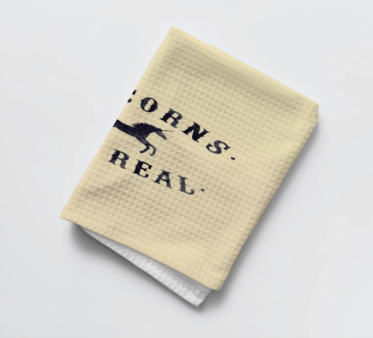 Unicorns Are Real I tea towel by Florent Bodart