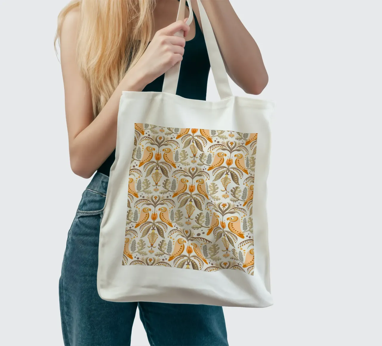 Tropical patterns with parrots and flowers in boho colours tote bag by CoelfenArt