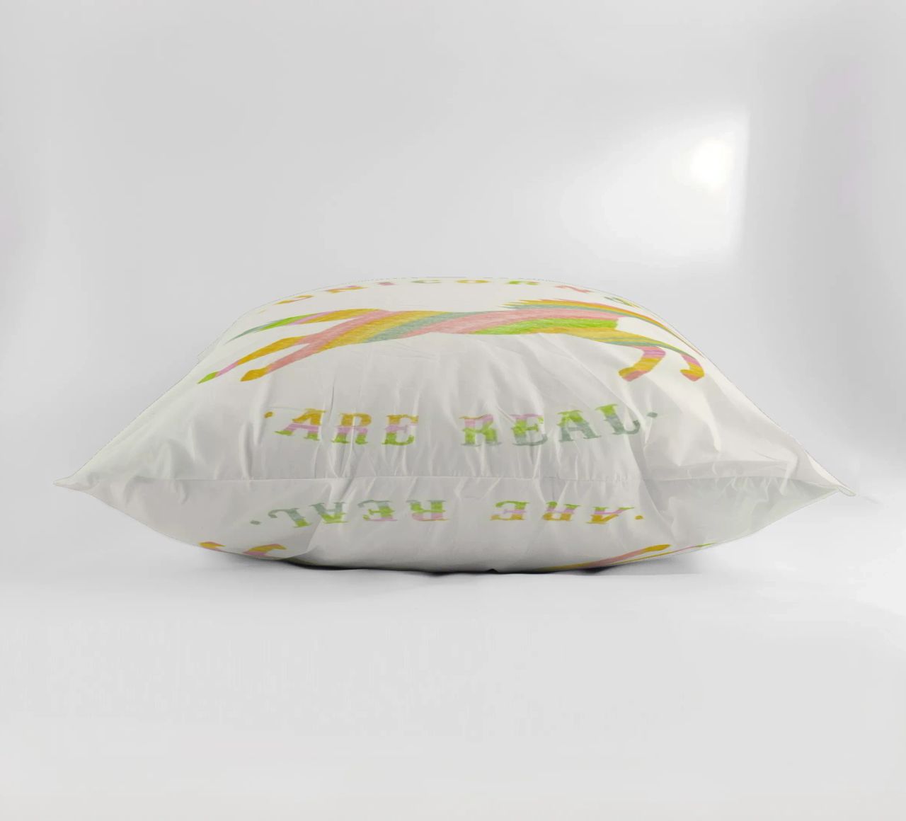 Unicorns Are Real II decorative cushion by Florent Bodart