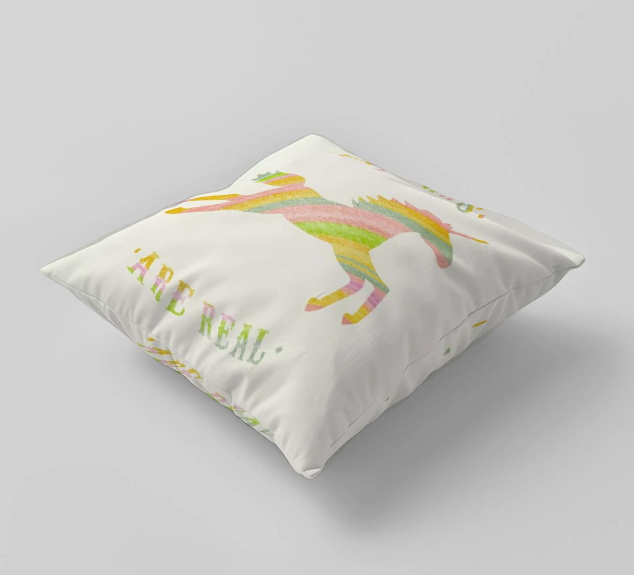 Unicorns Are Real II decorative cushion by Florent Bodart