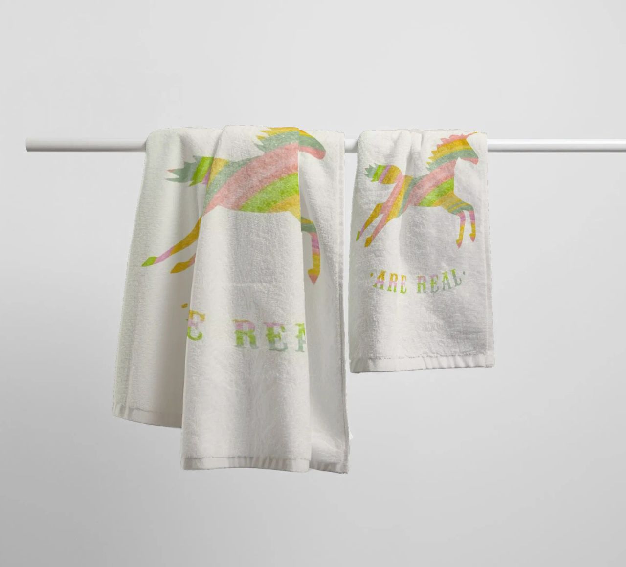 Unicorns Are Real II towel by Florent Bodart