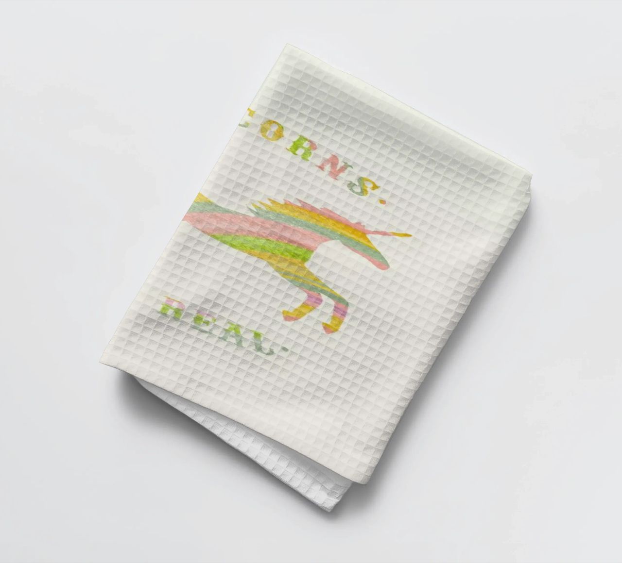 Unicorns Are Real II tea towel by Florent Bodart