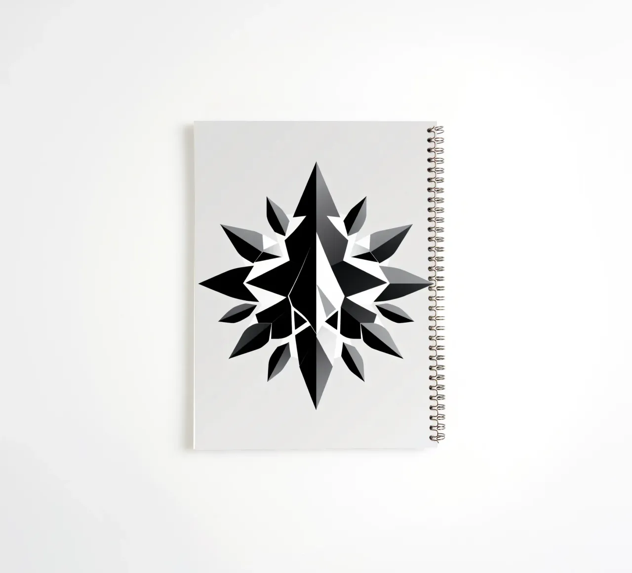 Abstract geometric design of a black and white star shape spiral notebook by DesignDoodle