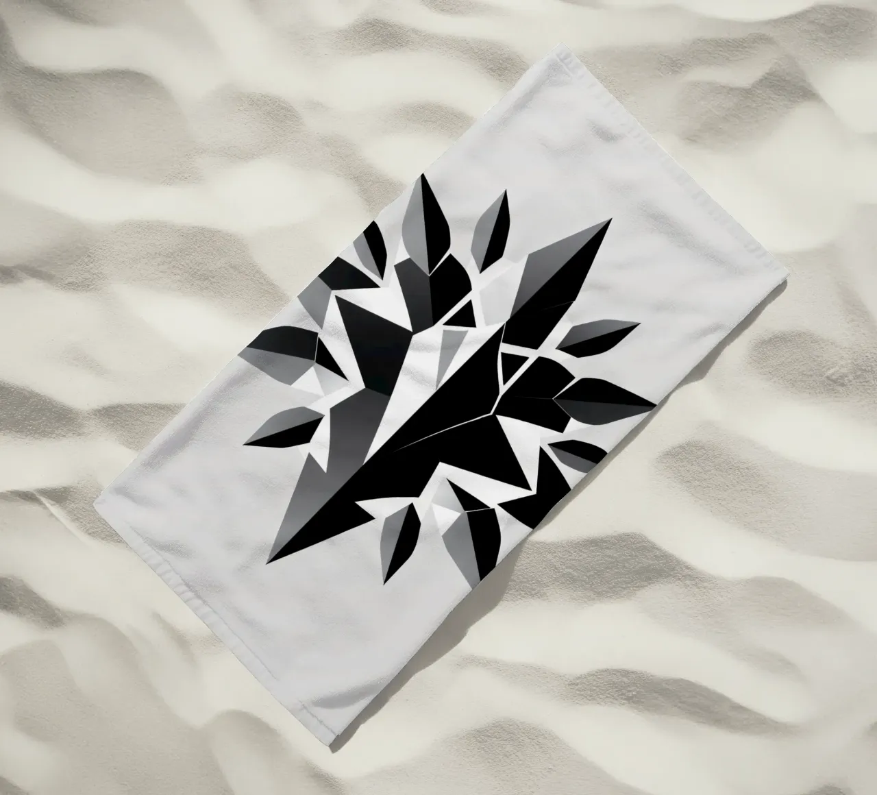 Abstract geometric design of a black and white star shape beach towel by DesignDoodle