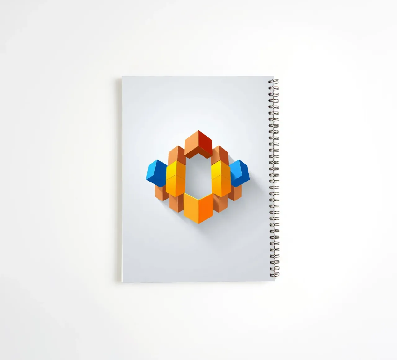 Colorful geometric shapes arranged in a creative pattern spiral notebook by DesignDoodle