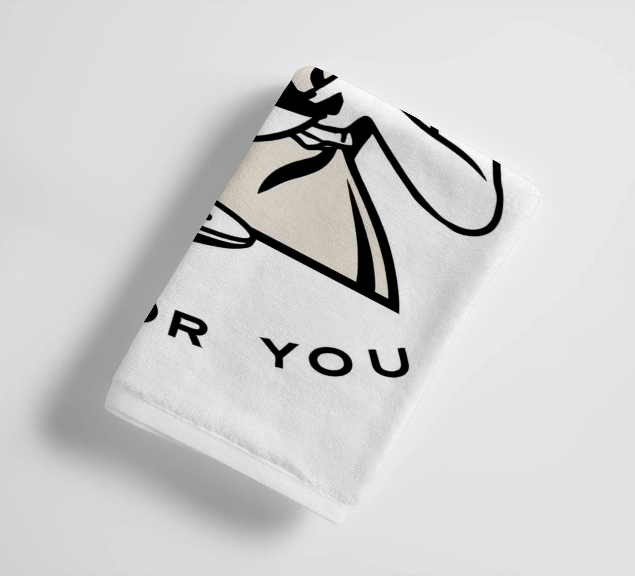 A woman in an apron prepares a meal while smiling towel by DesignDoodle