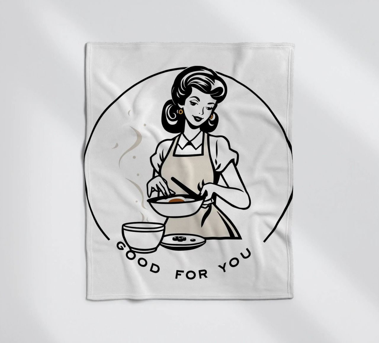 A woman in an apron prepares a meal while smiling fleece blanket by DesignDoodle