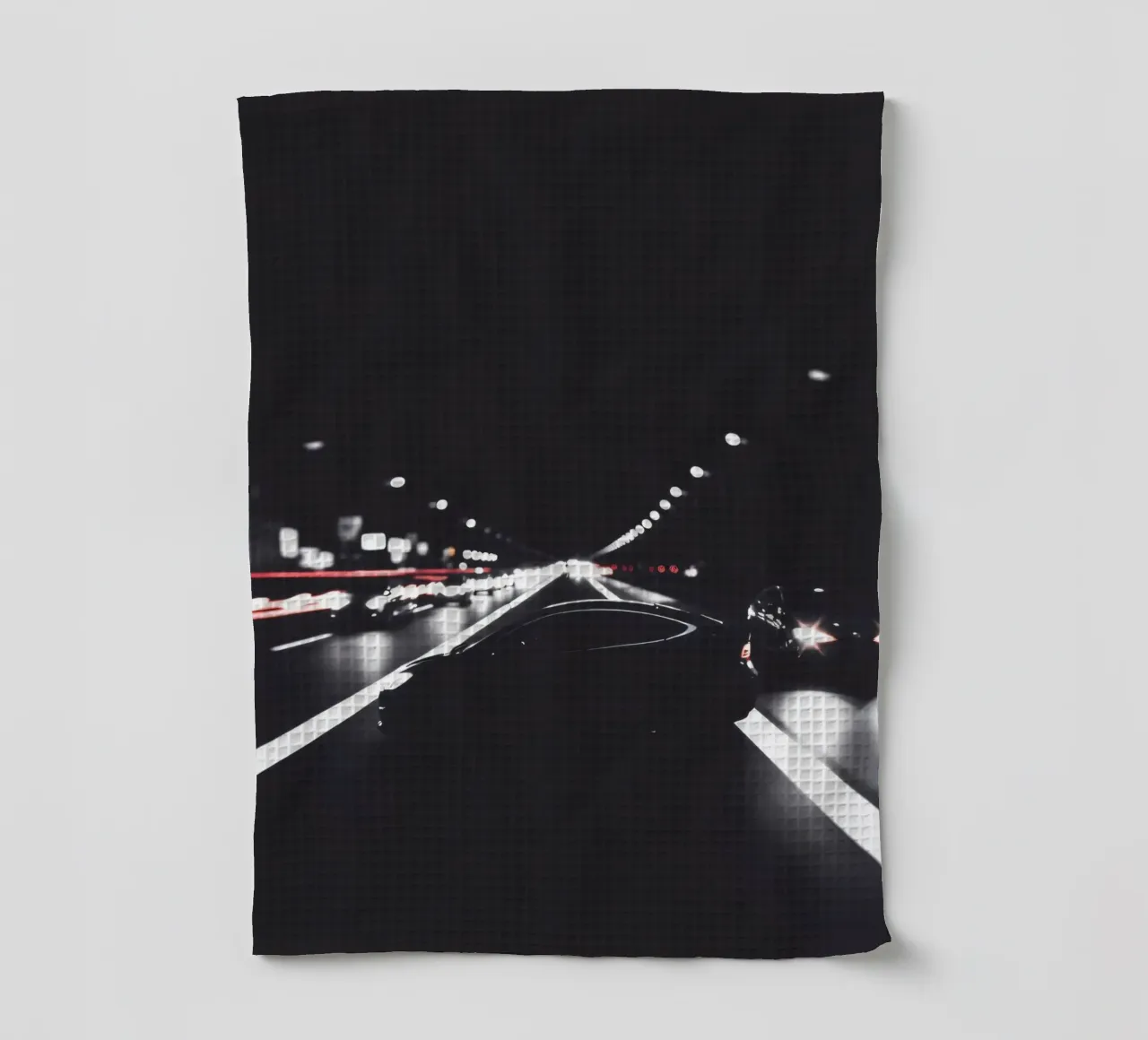 Nighttime city highway with moving vehicles illuminated tea towel by DesignDoodle