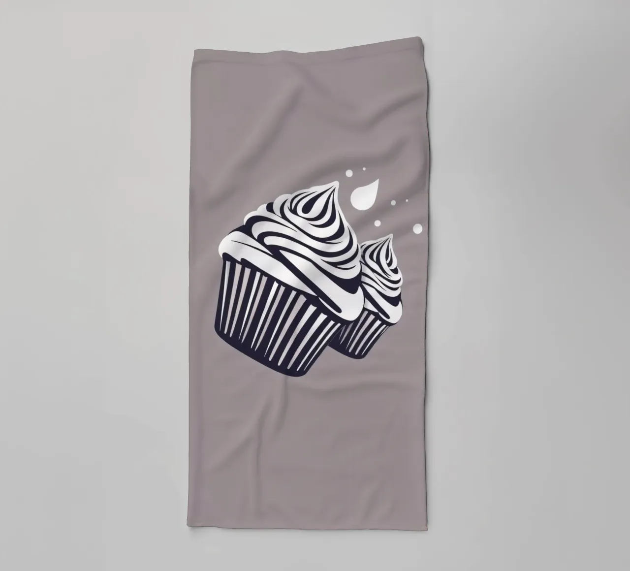 Two elegantly designed cupcakes with swirled frosting towel by DesignDoodle