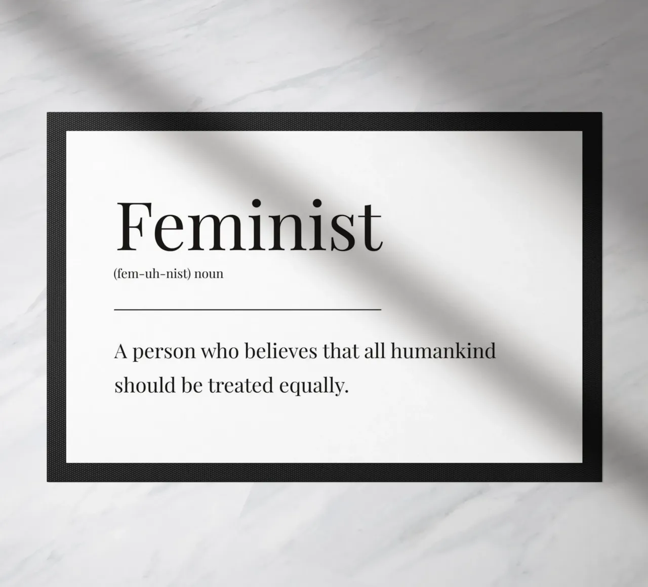 Feminist definition doormat by Paigaam Studio
