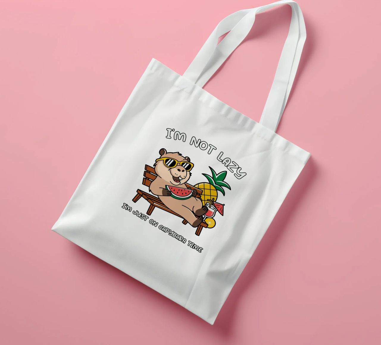 I'M NOT LAZY. I'M JUST ON CAPYBARA TIME tote bag by edsonramosart