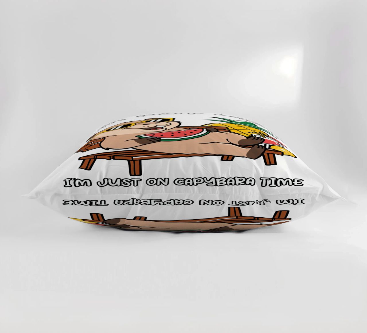I'M NOT LAZY. I'M JUST ON CAPYBARA TIME decorative cushion by edsonramosart