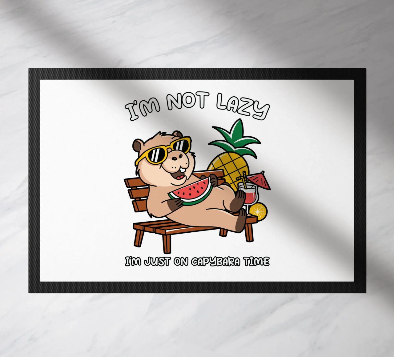 I'M NOT LAZY. I'M JUST ON CAPYBARA TIME doormat by edsonramosart