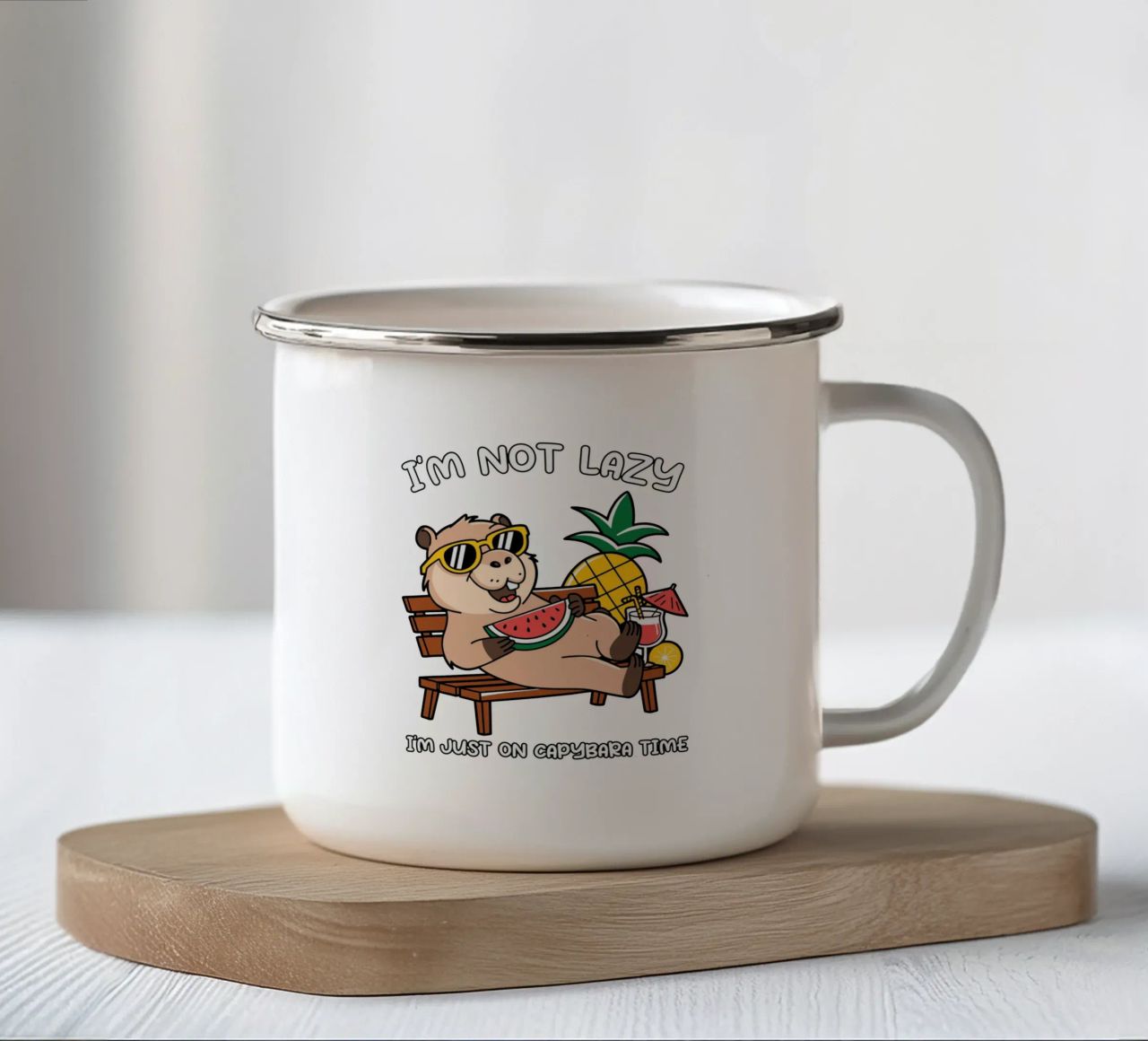 I'M NOT LAZY. I'M JUST ON CAPYBARA TIME enamel mug by edsonramosart