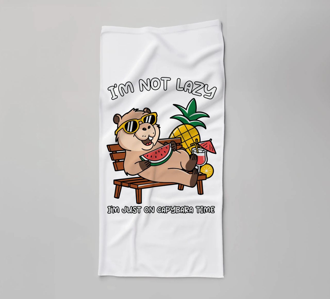 I'M NOT LAZY. I'M JUST ON CAPYBARA TIME towel by edsonramosart