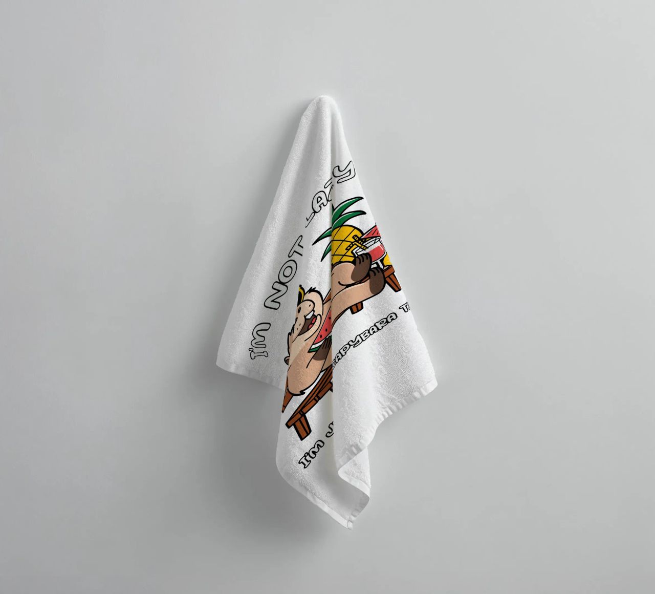 I'M NOT LAZY. I'M JUST ON CAPYBARA TIME towel by edsonramosart