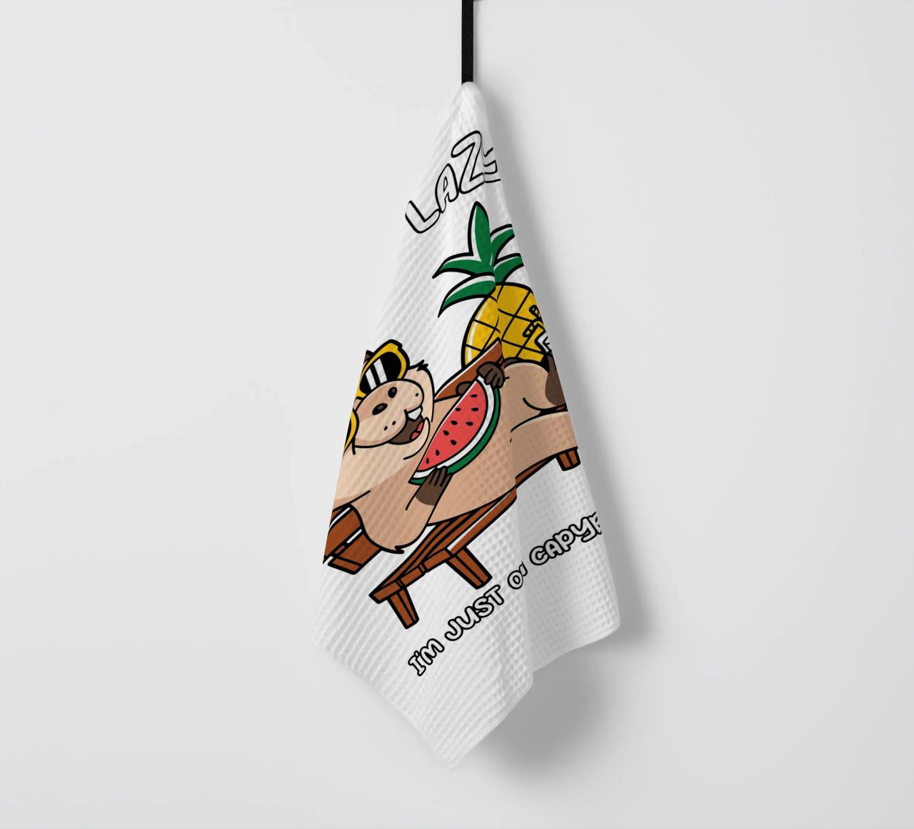 I'M NOT LAZY. I'M JUST ON CAPYBARA TIME tea towel by edsonramosart