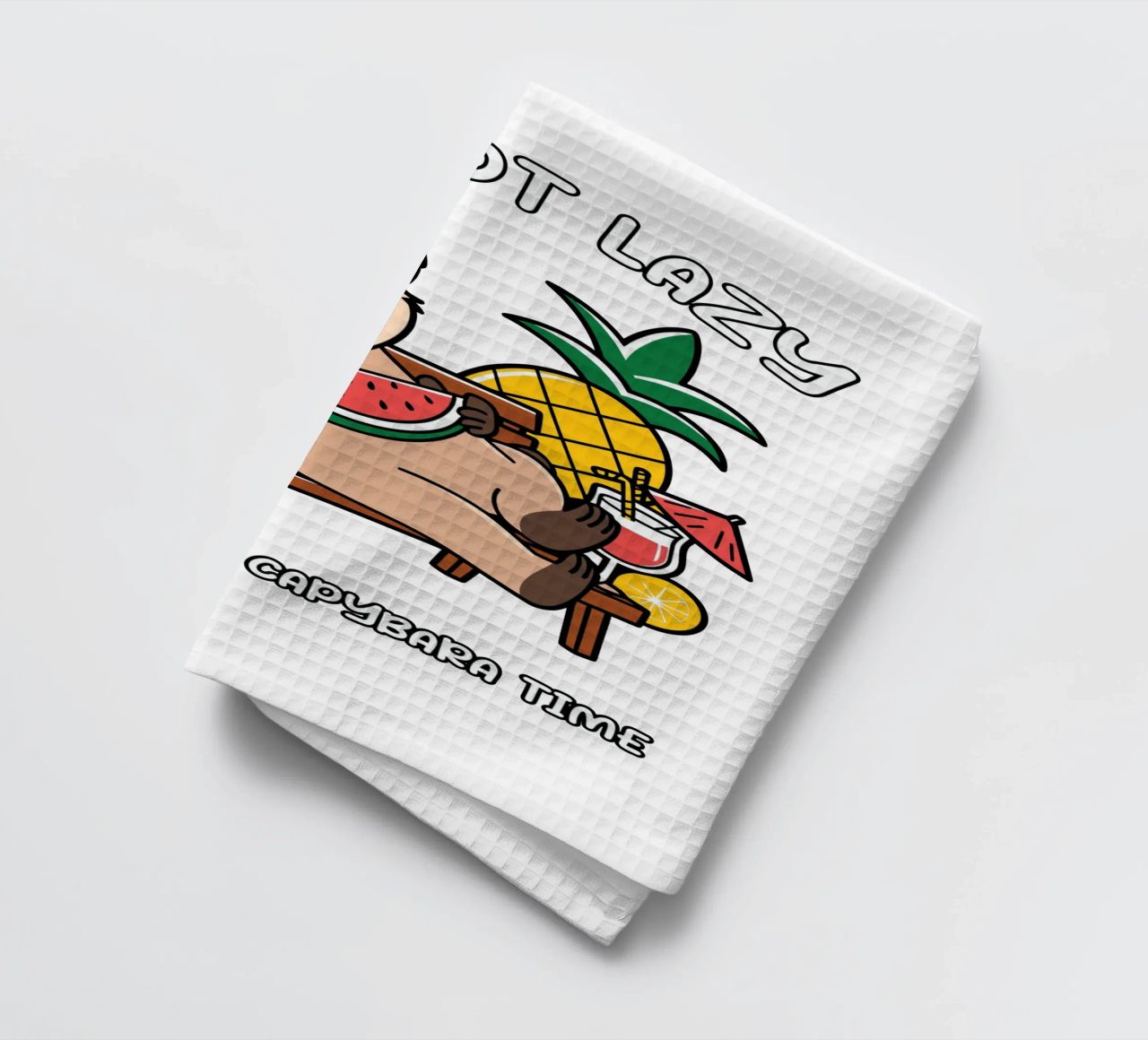I'M NOT LAZY. I'M JUST ON CAPYBARA TIME tea towel by edsonramosart