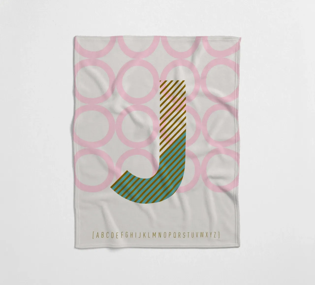 J Typeface Alphabet coperta in pile da lazydaypaper