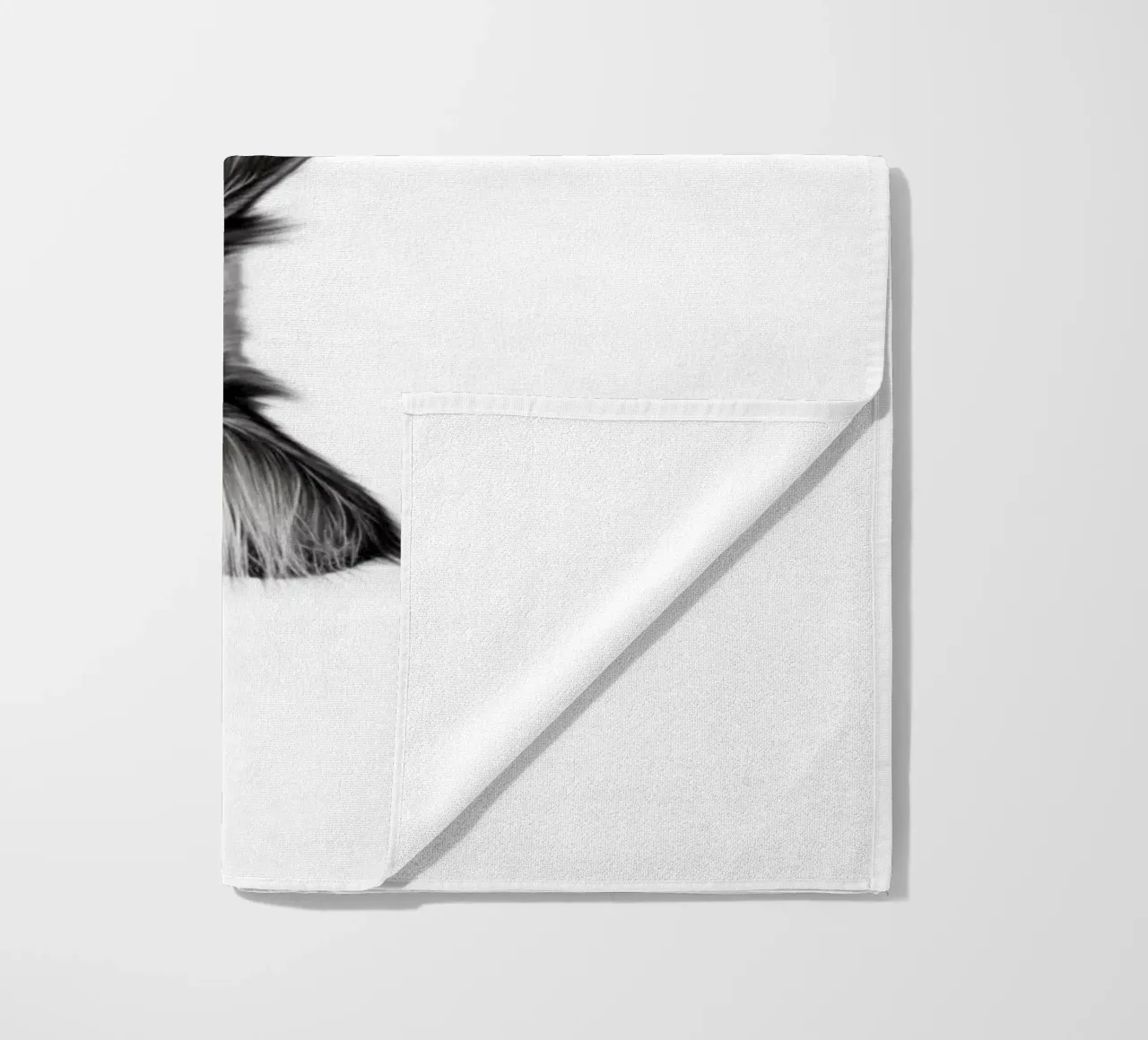 Un simpatico gattino dice "ciao" telo mare da Carinaprint